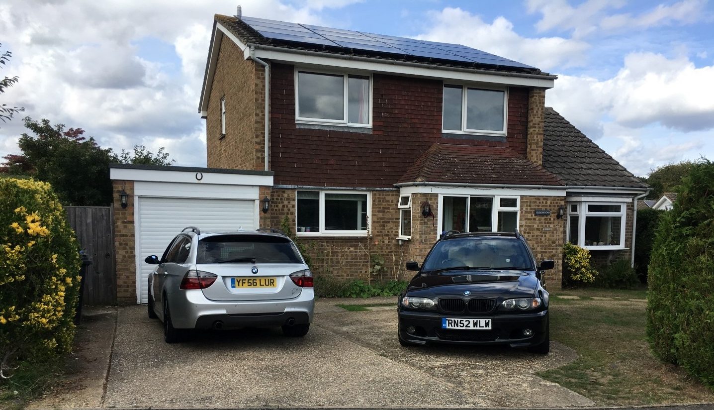 335d and 330d in front of house